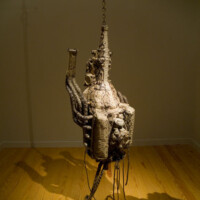 James Drake, "Artificial Life in the Valley of the World", 1994, automobile Engine, python snakeskin, 84” x 24” x 22”