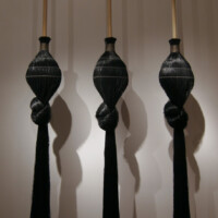 Susan Plum, "Luz y Solidaridad - Light and Solidarity", 2004-2006, wooden dowels, vinyl threads, and performance video