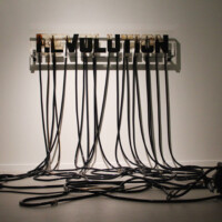 Andrei Molodkin, REVOLUTION, 2011, acrylic block and plastic hoses filled with crude oil, pump, compressors