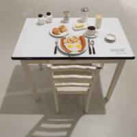 Forrest Prince, "You’re Eating Yourself to Death, and You’re Too Dumb to Know It", 1990, table, chair, mixed media, collection of Carolyn Farb