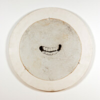 Mel Chin - Do Not Ask Me, "THE PRESENCE OF TRAGEDY" - A smile is not a smile in the time of AIDS. Enameled steel, plaster, 1989