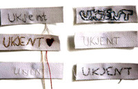 Lise Bjørne, "Desconocida Unknown Ukjent", 2006, 1023 cotton labels, silk string, and sewing pins