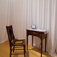 Carmen Montoya, "El Aire Me Habla de Ti The Wind Speaks to Me of You", 2006, single-channel digital video, four channel surround sound, found furniture, custom software, and current online weather data from Ciudad Juarez, Mexico