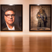 Andres Serrano, (left) "John Kiriakou", Former CIA Officer. Whistleblower, 2015; (right) "Man in Camouflage Suit", installation view "Torture" Station Museum of Contemporary Art, 2017